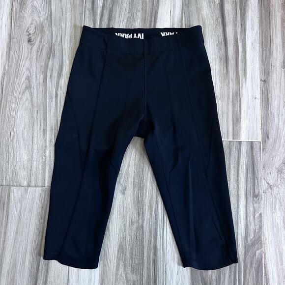 IVY PARK Leggings Sz M black Logo Waist pull on athletic Gym Capri Biker Pockets - Picture 2 of 6